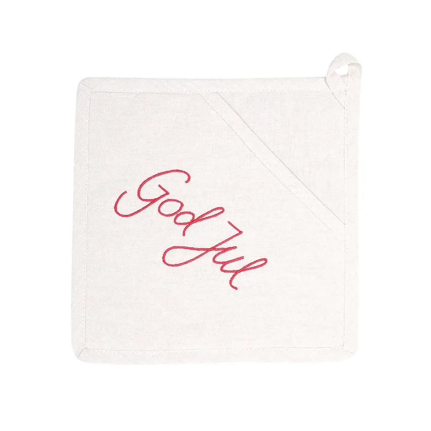 Grytlapp i ljus linnefärg med texten God Jul broderat i rött.
