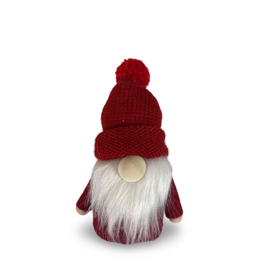 Tomte Santa Baby från Miljögården med röd luva och skägg i filt, ull och trä.